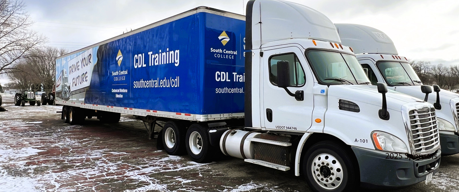 Photo of SCC's semi-trucks and trailer