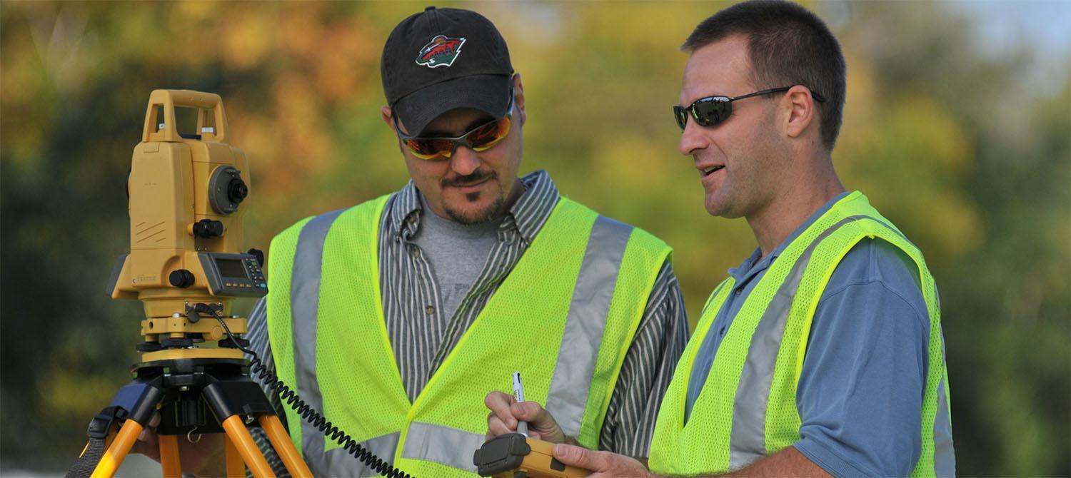 Photo of civil engineering student and instructor