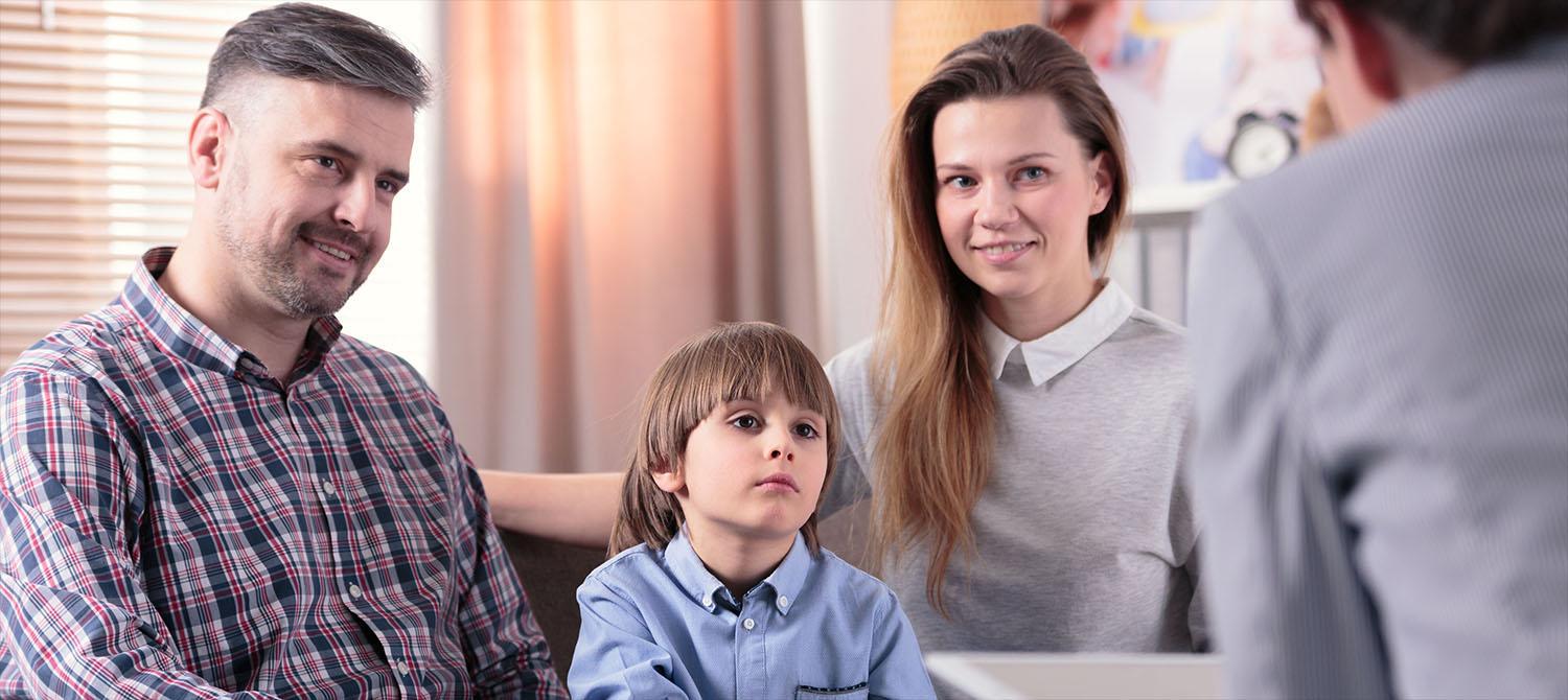 Photo of family in office setting